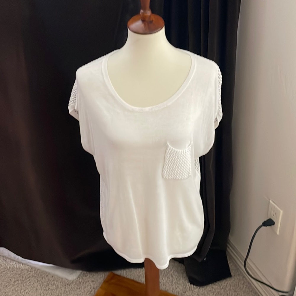 White sleeveless top